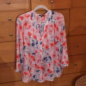 3/4 sleeve v-neck button down blouse.